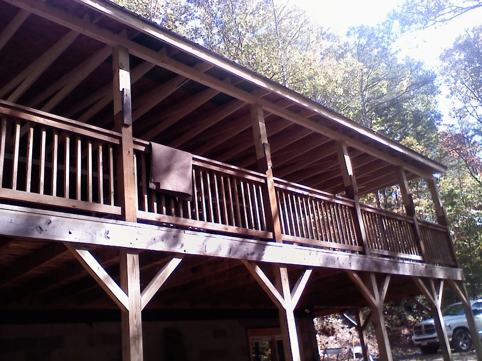 Timber framing under a new elevated porch and deck — Roof Leak Repair in Morehead by Roofing Brothers